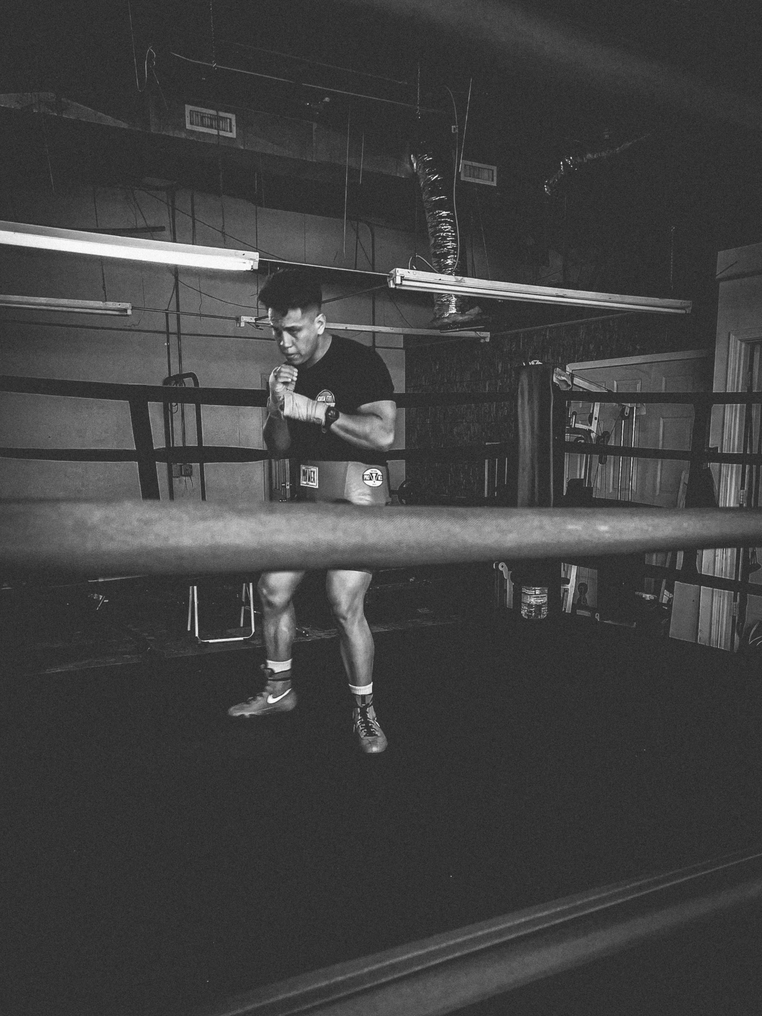 Black & white boxer in the ring